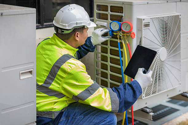 Professional Air Duct Cleaning technician working in Vincent, AL